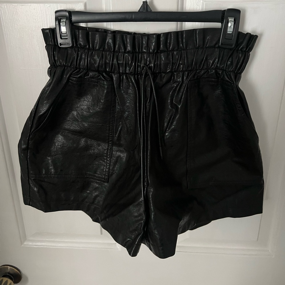 Black leather paperbag waist shorts. Amazon brand. Size medium. New with tags